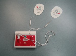 AED trainer with adult pads